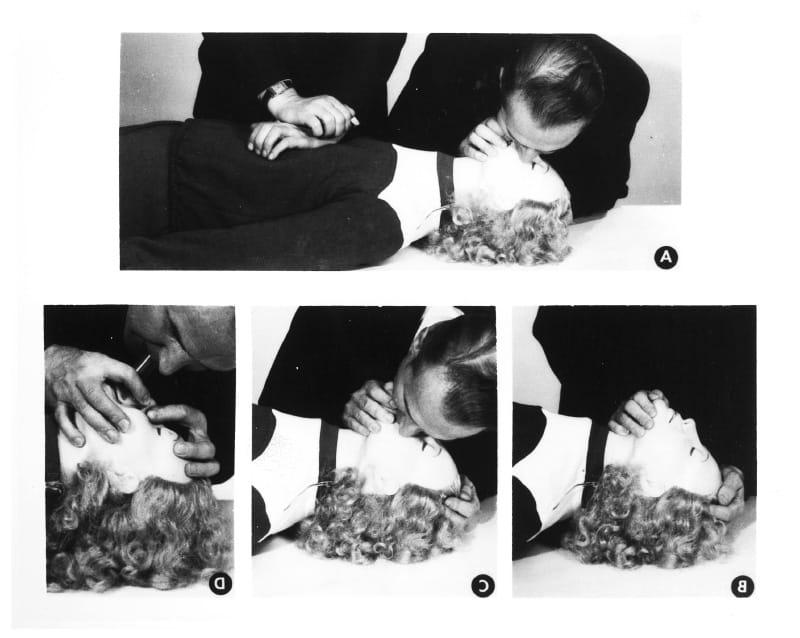 Asmund Laerdal demonstrates CPR on the original Resusci Anne manikin. (American Heart Association archives)